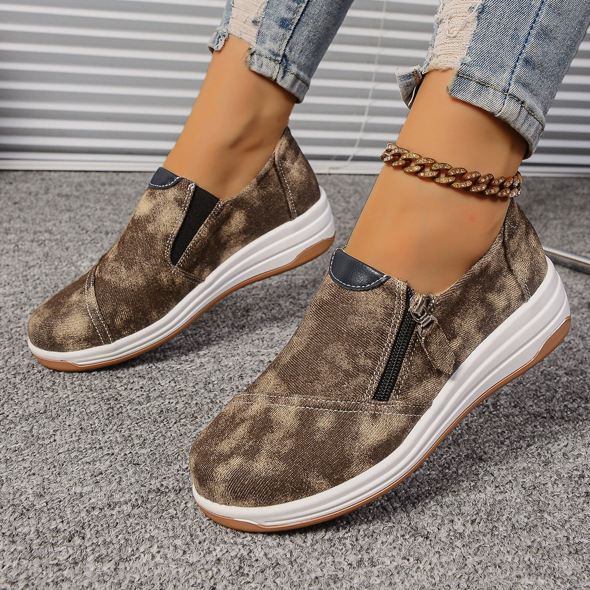 Brown tie-dye casual slip-on sneakers with side zipper and chunky sole.