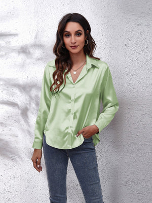 Light green satin collared button-down shirt with long sleeves.