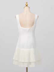 White mini dress with square neck and pleated tiered hem