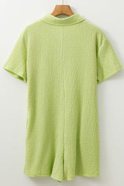 Lime textured collared romper with short sleeves and patch pocket detail