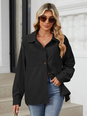 Black corduroy overshirt with buttoned patch pockets and a collared neckline.