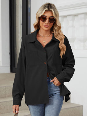 Black corduroy overshirt with buttoned patch pockets and a collared neckline.