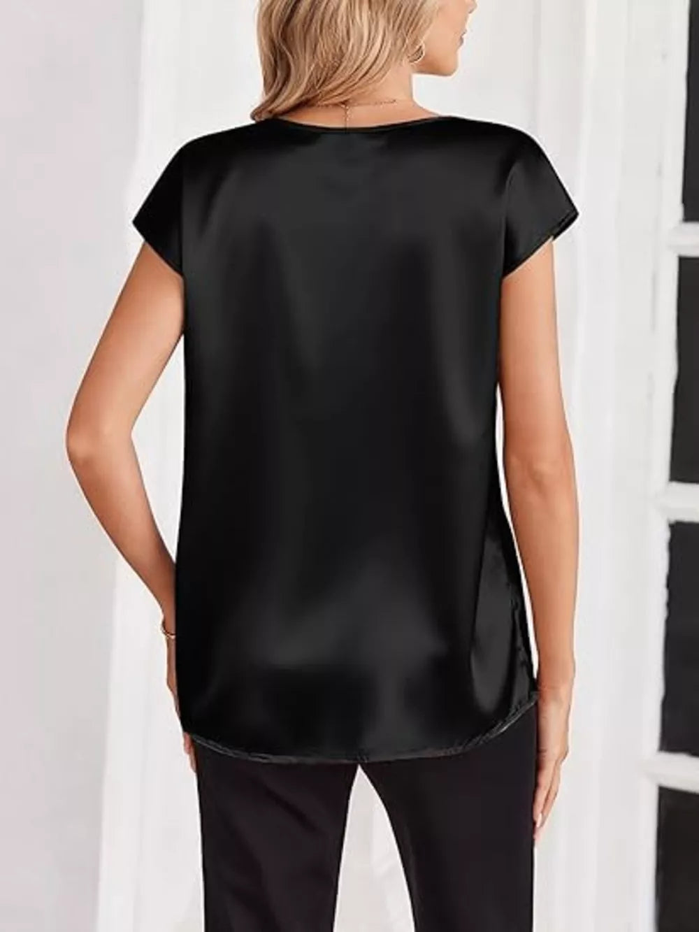 Black satin V-neck short sleeve maternity shirt with a relaxed fit.
