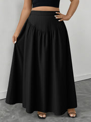 Black a-line maxi skirt with subtle vertical ribbing and a gathered waistband.