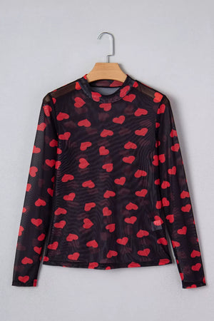 Black sheer mesh long sleeve top with all-over red heart print and mock neck.