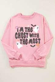 Blush pink crewneck sweatshirt with a spooky ghost and bat graphic and text that reads "I'm the ghost with the most.