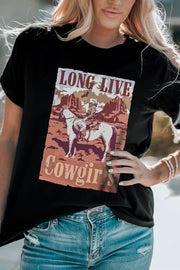 Black graphic tee with a desert landscape and cowgirl on horseback, reading Long Live Cowgirls.