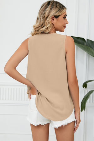 Lace-trimmed V-neck tank top in cream with a curved hem.