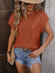 Ribbed knit pocket tee in black, caramel, tan, or sage. Acrylic.