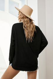 Black sweatshirt with asymmetric hemline and raw edge detail