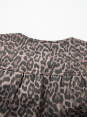 Leopard print denim V-neck top with pleat detail at yoke