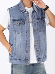 Light wash denim vest for men with button front, collar, and chest pockets.