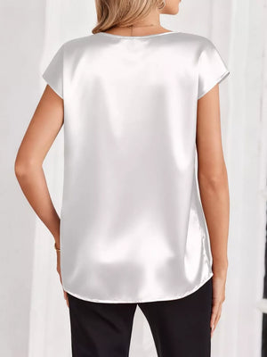 White satin V-neck blouse with short sleeves and a relaxed fit.
