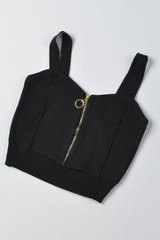 Black ribbed knit crop top with exposed gold zipper and ring pull.