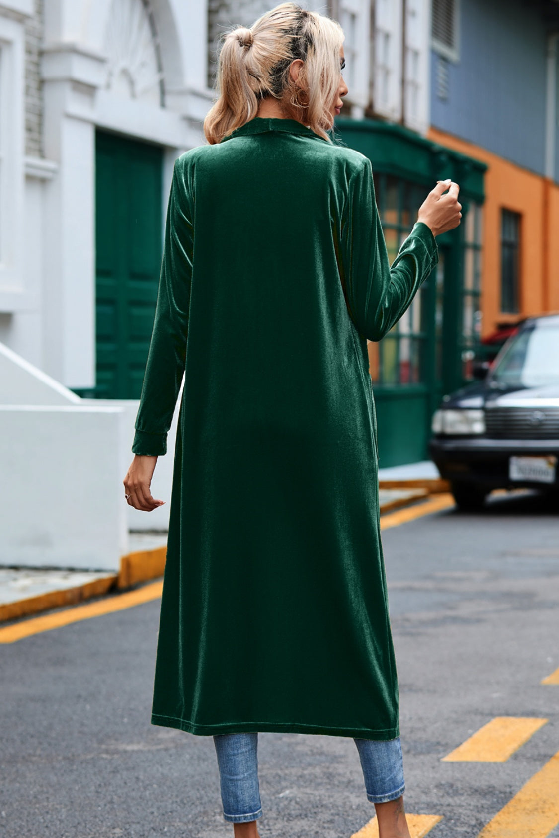 Dark green velvet duster coat with long sleeves, open front, and a relaxed fit.