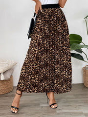 Leopard print maxi skirt with knife pleats and a black waistband.