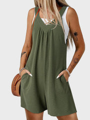 Moss green textured romper with V-neck, gathered yoke, and pockets.