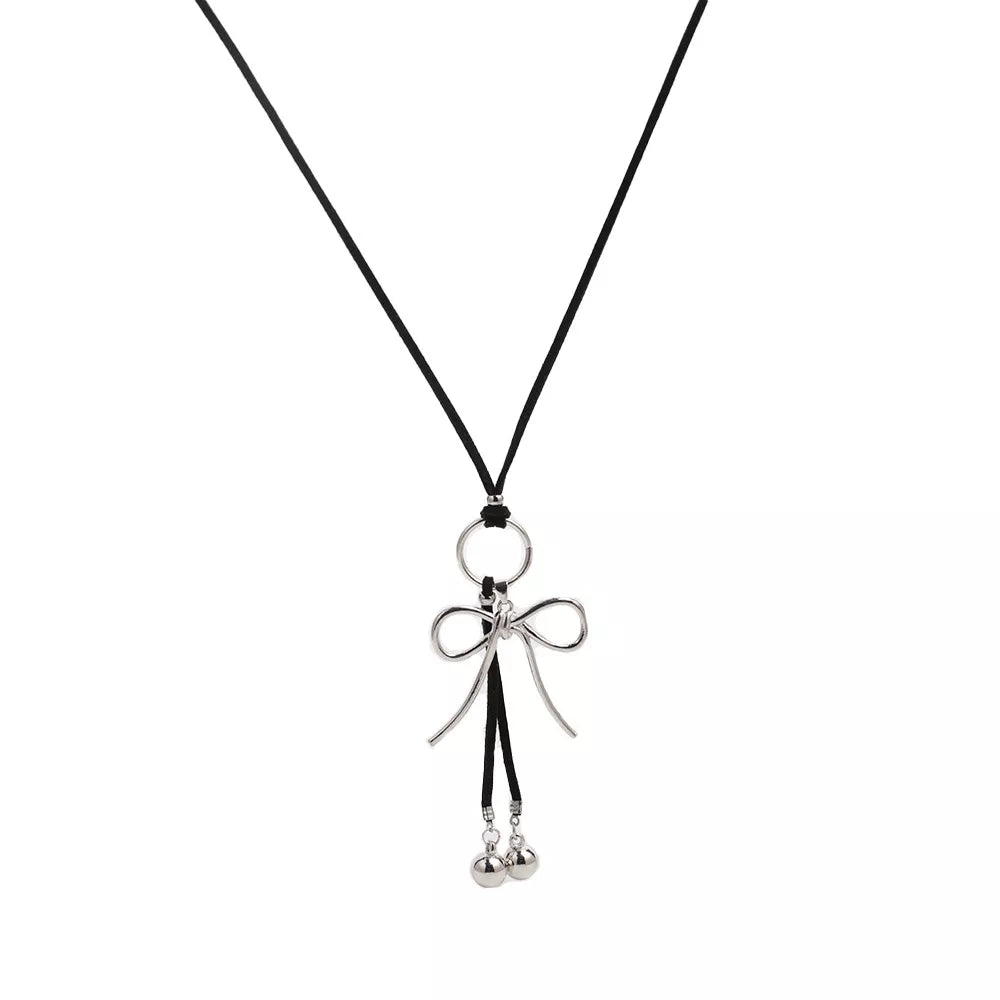 Elegant Bow Pendant Faux Leather Necklace in Silver, editorial view