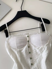 White lace ruffle hem tank top with button front and sheer bust detail