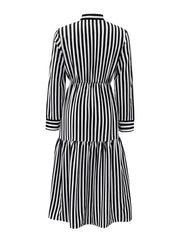 Notched long-sleeve midi dress in black and white stripe with a tiered skirt.