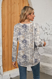 Long sleeve blouse with geometric tile print in beige and blue, featuring a gathered square neck.
