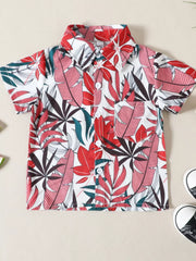 Toddler tropical leaf print button-front shirt with pocket, cotton blend.