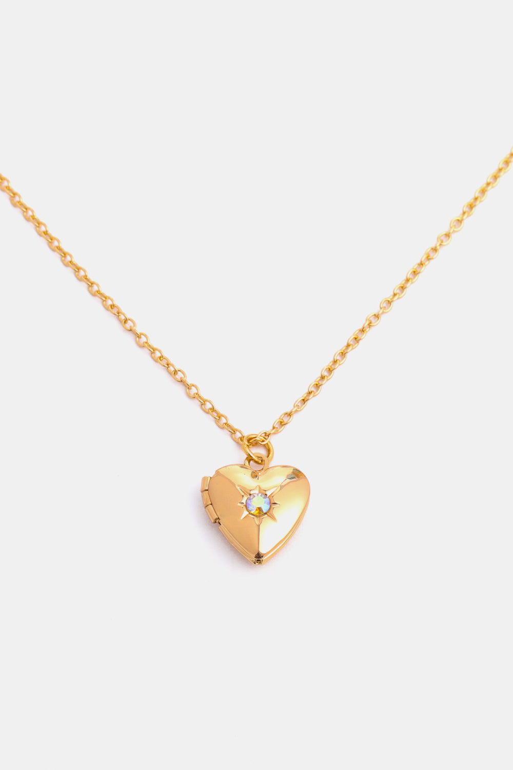Gold heart locket necklace with iridescent gemstone detail and 14k gold chain