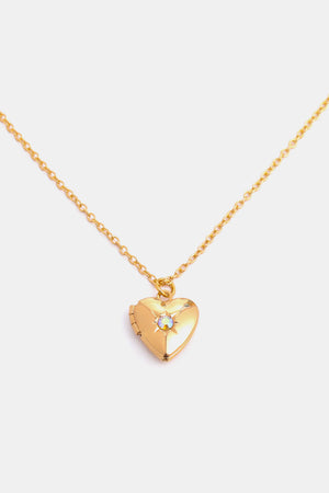 Gold heart locket necklace with iridescent gemstone detail and 14k gold chain