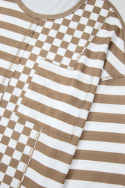 Camel and white checkered and striped knit top with a chest pocket.