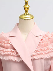 Pink skirt suit with elegant frill collar and balloon sleeves