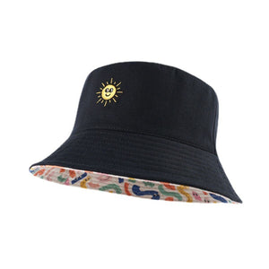 Black cotton bucket hat with embroidered sun and abstract patterned lining