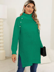 Green ribbed turtleneck tunic with pearl button detail on shoulder and side slits