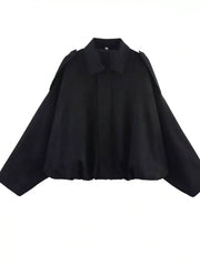 Black oversized zip-up jacket with a collar and shoulder details.