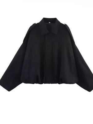 Black oversized zip-up jacket with a collar and shoulder details.