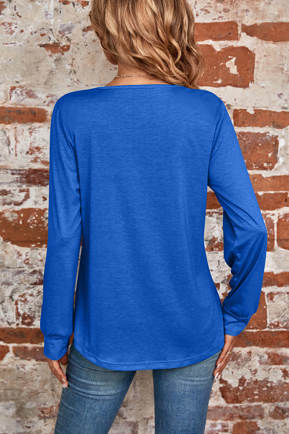 Blue long sleeve top with square neckline and casual fit