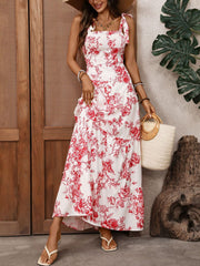 Floral tie strap maxi dress with tiered skirt and square neckline.