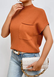Ribbed knit mock neck top in caramel with a chest pocket and short sleeves.