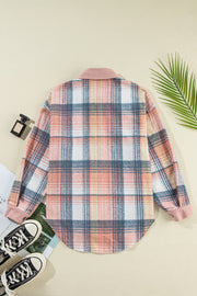 Colorblock plaid shacket with ribbed collar and cuffs in pale blush and brown hues.