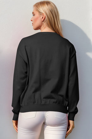 Black crewneck sweater with elasticized hem and cuffs, acrylic knit.