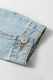 Light wash denim trucker jacket with button detail and contrast stitching