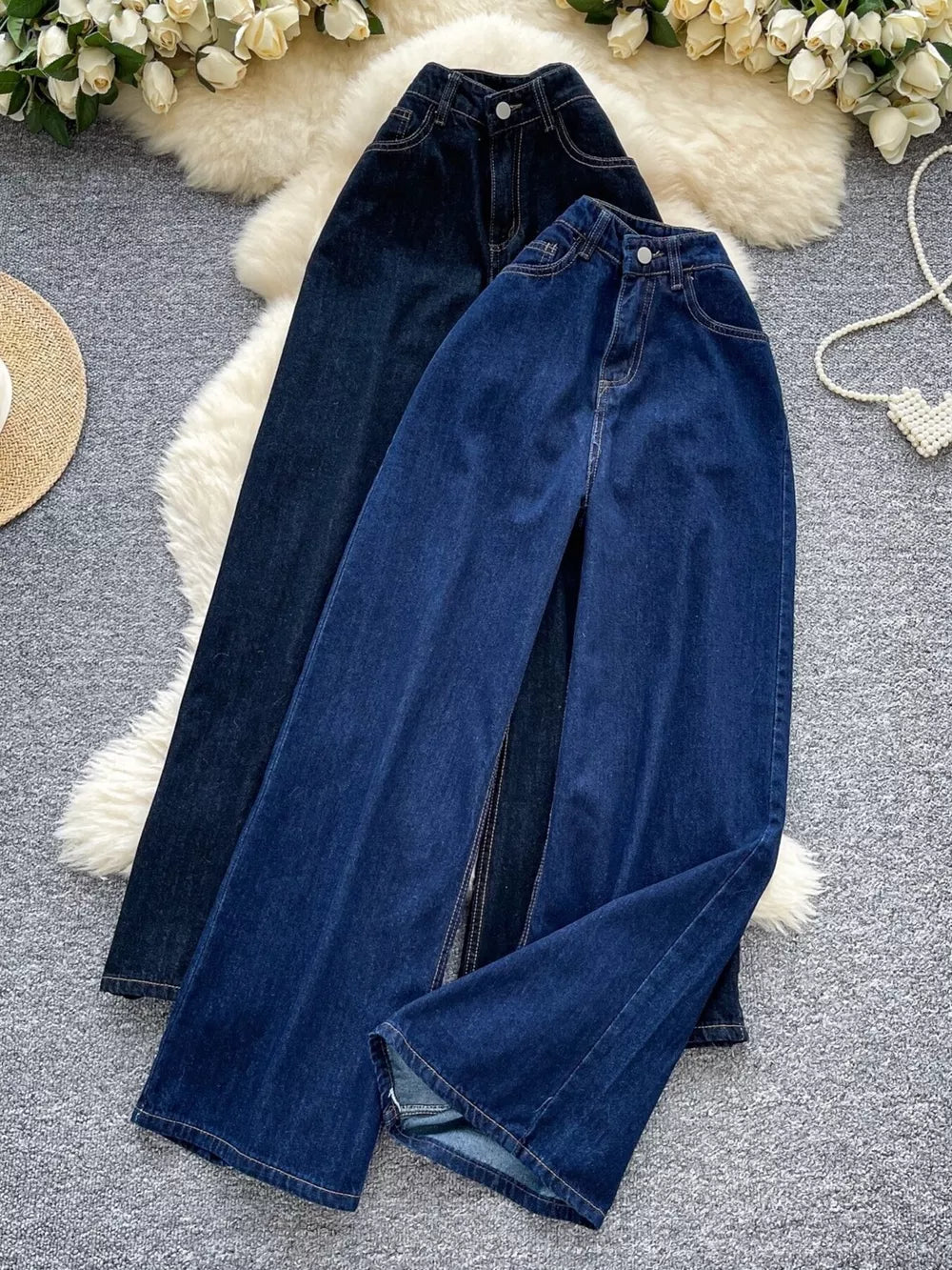 Maternity wide leg jeans in medium and dark denim with high rise and flared hems.