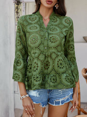 Moss green eyelet embroidered peplum blouse with ruffles and bell sleeves.
