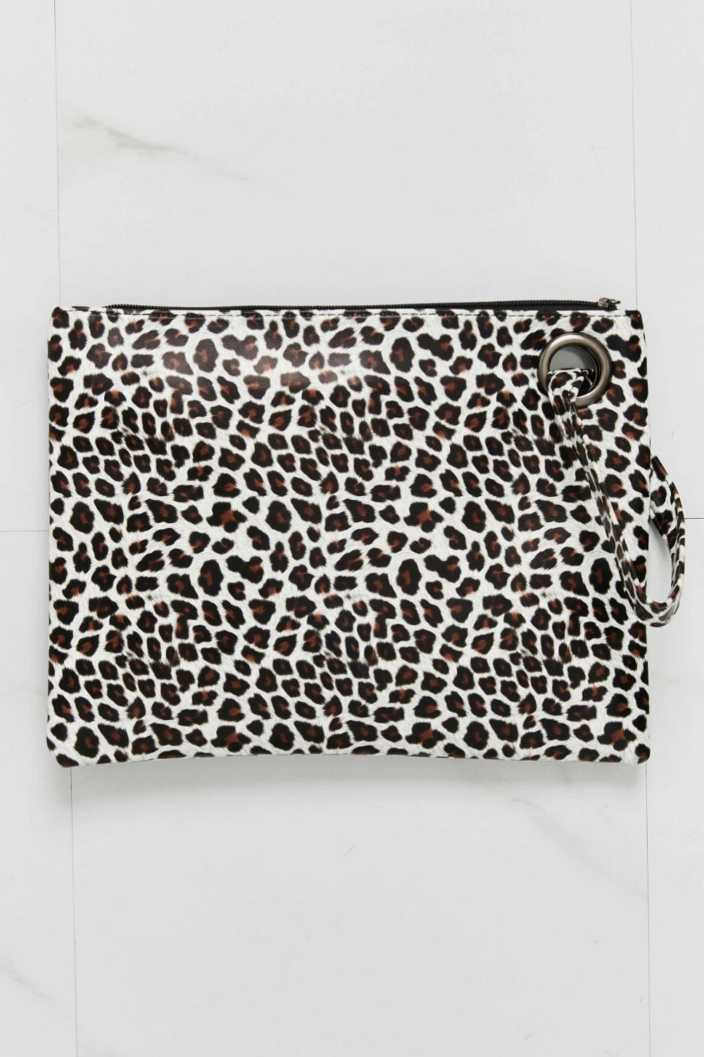 Leopard print clutch bag with wristlet strap and silver hardware