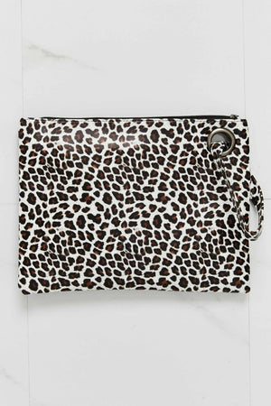 Leopard print clutch bag with wristlet strap and silver hardware