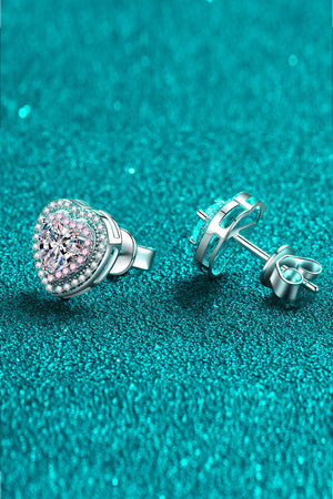 Silver heart halo stud earrings with pink accents and clear center stone