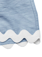 Blue maternity romper cover-up with white scalloped trim detail.