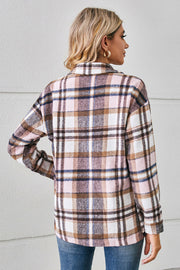 Soft plaid overshirt in blush pink with button front and patch pockets.