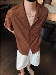 Brown textured knit short-sleeve men's shirt with classic collar and button-front