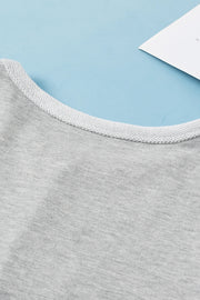 Light gray sweatshirt with a textured crew neck detail.