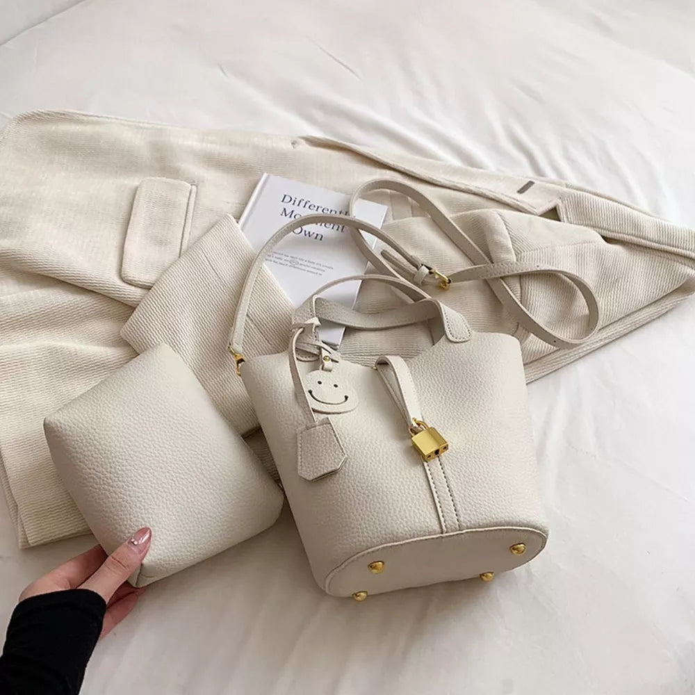 Bucket Crossbody Bag With Lock Detail in White, close-up detail
